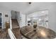 Dining room with modern décor, hardwood floors, and stairs leading to the upper floor at 1464 Nemrick Pl, Castle Rock, CO 80109