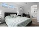 Bright main bedroom featuring a vaulted ceiling, 3 windows, and a cozy workspace at 1464 Nemrick Pl, Castle Rock, CO 80109