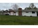 Spacious backyard with lush green grass, perfect for outdoor activities and relaxation at 8895 E Radcliff E Ave, Denver, CO 80237