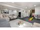 Finished basement with entertainment area, play area, and open floor plan at 8895 E Radcliff E Ave, Denver, CO 80237