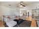 Bright living room with neutral decor, hardwood floors, and a comfortable seating arrangement at 8895 E Radcliff E Ave, Denver, CO 80237