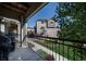Cozy covered balcony area ideal for outdoor dining and relaxation at 11250 Florence St # 17D, Commerce City, CO 80640