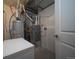 Unfinished basement area showing the HVAC and water heater at 11250 Florence St # 17D, Commerce City, CO 80640