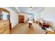 A versatile room with sewing and ironing amenities with ample storage and workspace for creative projects at 12984 Crowfoot Springs Rd, Larkspur, CO 80118