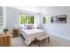 Light-filled bedroom with large windows and charming decor at 211 Rockview Dr, Superior, CO 80027