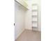 Walk-in closet with shelves and hanging rod for ample storage at 211 Rockview Dr, Superior, CO 80027