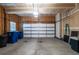 Spacious two car garage with exposed framing, perfect for storage and vehicles at 211 Rockview Dr, Superior, CO 80027