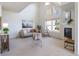 Bright living room with vaulted ceilings, a fireplace, and comfortable seating at 211 Rockview Dr, Superior, CO 80027
