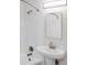 Bathroom featuring a shower/tub with a shower head and a pedestal sink with a mirrored cabinet at 5099 S Linden Dr, Englewood, CO 80110