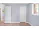 Bright bedroom with hardwood floors and a closet, offering a comfortable and functional space at 5099 S Linden Dr, Englewood, CO 80110