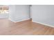 Bright living room featuring hardwood floors and neutral paint at 5099 S Linden Dr, Englewood, CO 80110