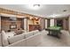 Entertainment room features a pool table, wet bar, fireplace and comfortable seating at 16720 E Layton Ave, Aurora, CO 80015