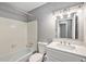 Bathroom with standard tub, toilet and sink at 16720 E Layton Ave, Aurora, CO 80015