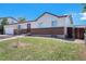 Charming single-Gathering home featuring brick accents and a well-maintained front yard at 16720 E Layton Ave, Aurora, CO 80015