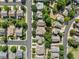 Birds eye view of the home's location within a quiet neighborhood surrounded by lush greenery at 6808 Silverleaf Ave, Firestone, CO 80504