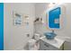 Charming powder room featuring a unique bowl sink, modern faucet, and a decorative framed mirror at 6808 Silverleaf Ave, Firestone, CO 80504