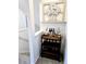 Cozy nook featuring a bar cart with beverages, glassware, and a decorative tree above at 10052 Zeno St, Commerce City, CO 80022