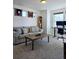 Comfortable bedroom/office featuring natural light and stylish decor at 10052 Zeno St, Commerce City, CO 80022