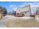 Fenced backyard with a spacious deck, perfect for outdoor enjoyment at 9676 Whitecliff Pl, Highlands Ranch, CO 80129