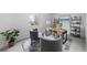 Bright office space featuring modern chairs, a wooden desk, and stylish shelving for a productive work environment at 9676 Whitecliff Pl, Highlands Ranch, CO 80129