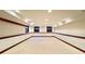 Bright basement with neutral carpet, wood trim and natural light at 4600 S University Blvd, Englewood, CO 80113