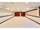 Spacious carpeted basement with ample storage and recessed lighting at 4600 S University Blvd, Englewood, CO 80113