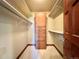 Walk in closet featuring built in shelving and storage at 4600 S University Blvd, Englewood, CO 80113