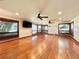 Spacious living room features hardwood floors, lots of natural light and two ceiling fans at 4600 S University Blvd, Englewood, CO 80113
