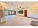Spacious living room featuring recessed lighting, ceiling fans, and a fireplace at 4600 S University Blvd, Englewood, CO 80113