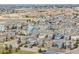 Expansive aerial view of the neighborhood showcasing the variety of home styles and community layout at 9694 Dunning Cir, Highlands Ranch, CO 80126