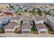 Backyard aerial shot showing yard sizes, neighborhood layout, and the positioning of garages and driveways at 9694 Dunning Cir, Highlands Ranch, CO 80126