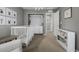 Cozy Bedroom featuring a crib, closet, dresser and neutral wall decor at 9694 Dunning Cir, Highlands Ranch, CO 80126