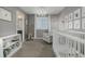 Bright Bedroom with plantation shutters, accent lighting and neutral décor at 9694 Dunning Cir, Highlands Ranch, CO 80126