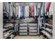 Walk-in closet with custom shelving, organized storage, and ample space for clothing at 9694 Dunning Cir, Highlands Ranch, CO 80126