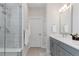 Well-designed bathroom with a modern walk-in shower and stylish vanity with contemporary fixtures at 4781 Saddle Iron Rd, Castle Rock, CO 80104