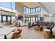 Open concept lounge featuring a bar and cozy seating for entertaining at 4781 Saddle Iron Rd, Castle Rock, CO 80104