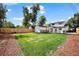 Expansive backyard with a shed, patio, and plenty of green space at 5570 Otis Ct, Arvada, CO 80002
