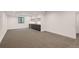 Spacious finished basement with neutral carpet and a stylish wet bar area, perfect for entertaining at 1459 W 42Nd Ave, Denver, CO 80211