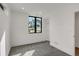 Bright bedroom with a view of the neighborhood and ample natural light at 1459 W 42Nd Ave, Denver, CO 80211