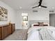 Serene bedroom with a view to an ensuite bathroom at 1459 W 42Nd Ave, Denver, CO 80211