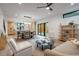 Bright open-concept living space with modern decor seamlessly connecting the kitchen, dining, and living areas at 1459 W 42Nd Ave, Denver, CO 80211