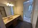 Bathroom with a long vanity and a sink at 5138 S Sedalia Ct, Centennial, CO 80015
