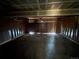 Spacious garage with concrete floor, room for storage and vehicle parking at 5138 S Sedalia Ct, Centennial, CO 80015