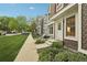 Street view of well-maintained townhouses with green grass and sidewalks at 1198 Milo Cir # A, Lafayette, CO 80026