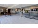 Expansive finished basement with pool table, bar area, lounge seating and entertainment center at 51 West Ranch Trl, Morrison, CO 80465
