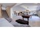 Spacious basement with a pool table, wet bar, and a motorcycle display, perfect for entertaining at 51 West Ranch Trl, Morrison, CO 80465