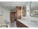Elegant bathroom features dual sinks, modern fixtures, tile flooring and separate shower at 51 West Ranch Trl, Morrison, CO 80465