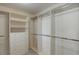 A walk-in closet equipped with shelving and racks for optimal storage at 51 West Ranch Trl, Morrison, CO 80465