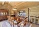 A spacious dining room featuring wooden table and chairs and elegant furnishings at 51 West Ranch Trl, Morrison, CO 80465