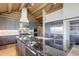 Chef's kitchen with a large island, modern appliances, and sleek finishes for cooking and entertaining at 51 West Ranch Trl, Morrison, CO 80465
